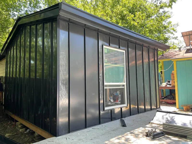 Black standing seam metal wall panels for Metal Roof Installation in Bremen