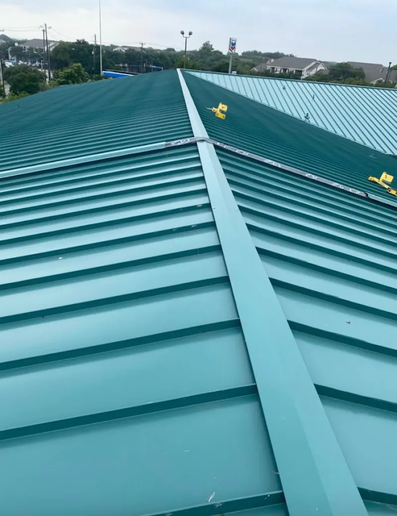 Green commercial metal roof ridge and valley for Metal Roof Repair in Bremen
