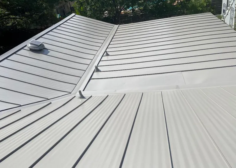 Solar attic fan installed on a metal roof for Roof Ventilation in Bremen